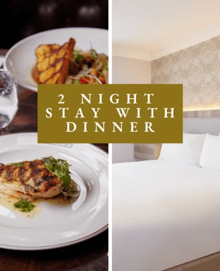 Elegant hotel room with king-size bed and gourmet dining with wine, perfect for a relaxing two-night stay.