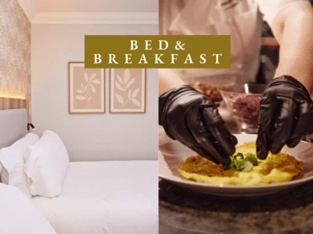 Elegant hotel room with soft lighting and luxurious bedding, and gourmet breakfast served by attentive staff. Book now.