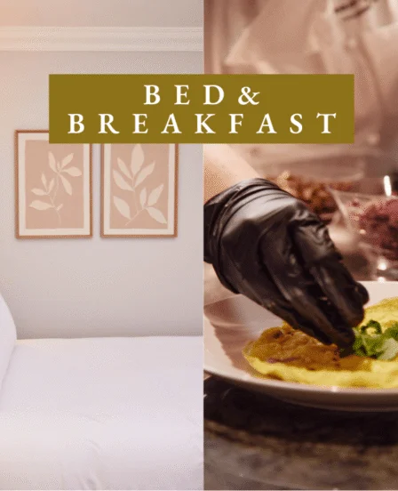 Elegant hotel room with soft lighting and luxurious bedding, and gourmet breakfast served by attentive staff. Book now.